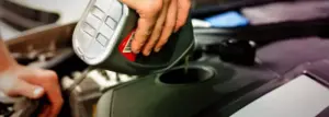 Person Pouring Car Oil