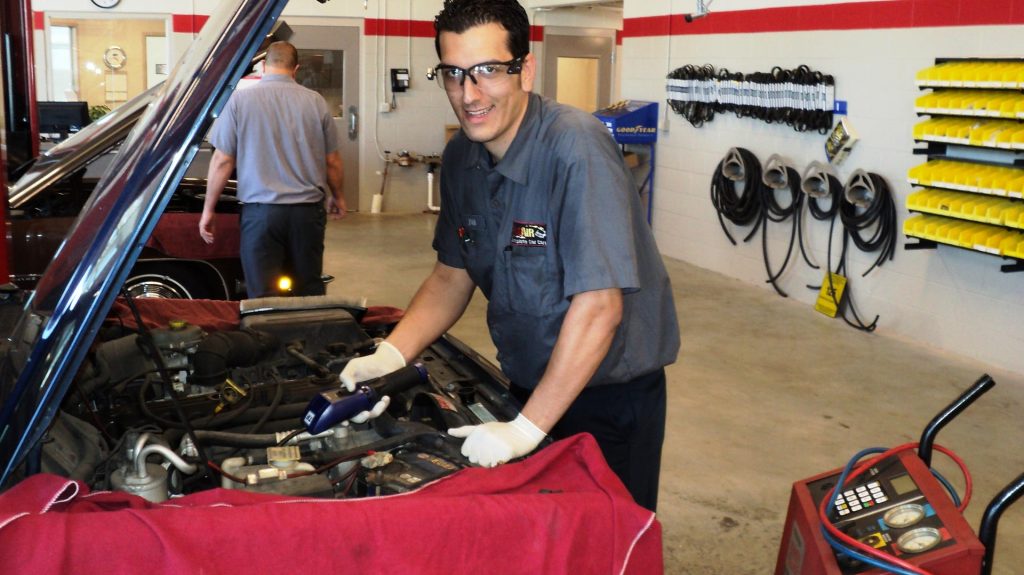 Rad Air technician working under the hood