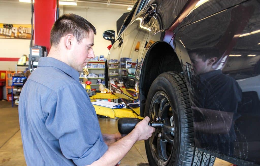 mechanic working on a vehicle