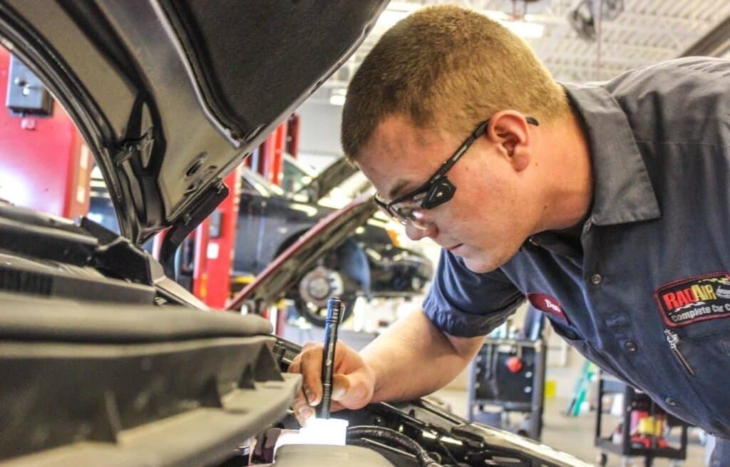 Rad Air automotive technician inspecting car