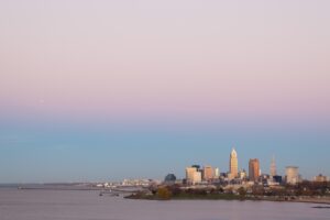 | Rad Air - STAGING The Cleveland skyline with a pink sky on the coast of Lake Erie for sunset